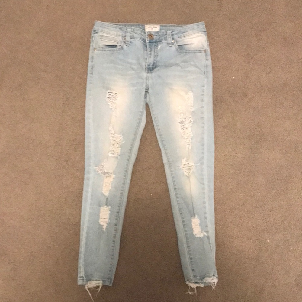 light blue ripped jeans